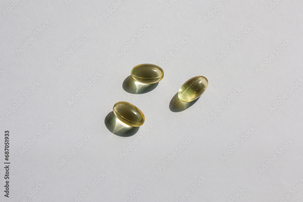 Transparent pills on a white background.
Transparent pills on a white background.