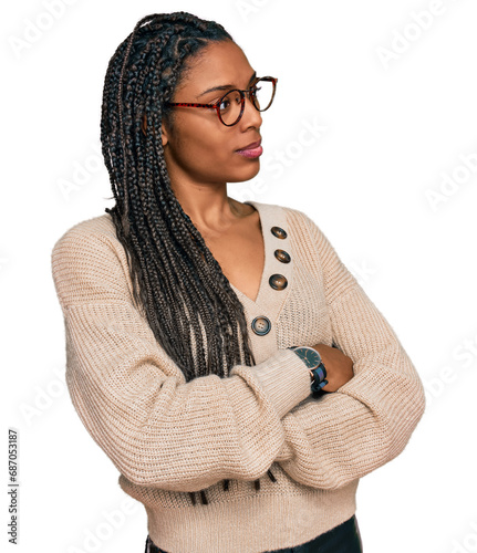 African american woman wearing casual clothes looking to the side with arms crossed convinced and confident