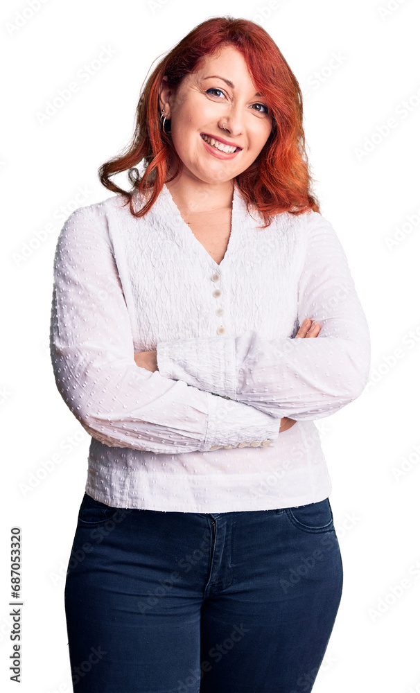 Young beautiful redhead woman wearing casual shirt happy face smiling with crossed arms looking at the camera. positive person. Young beautiful redhead woman wearing casual shirt happy face smiling with crossed arms looking at the camera. positive person.