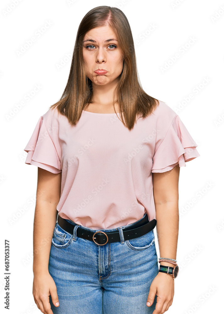 Obraz premium Beautiful caucasian woman wearing casual clothes depressed and worry for distress, crying angry and afraid. sad expression.