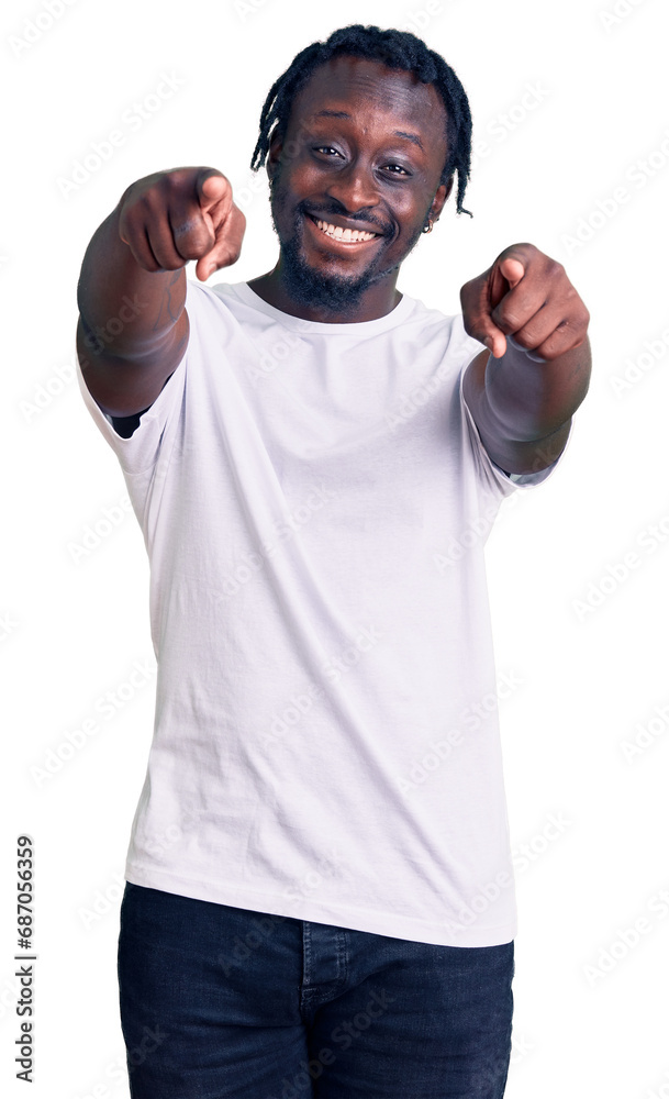 Young african american man with braids wearing casual white tshirt pointing to you and the camera with fingers, smiling positive and cheerful Young african american man with braids wearing casual white tshirt pointing to you and the camera with fingers, smiling positive and cheerful
