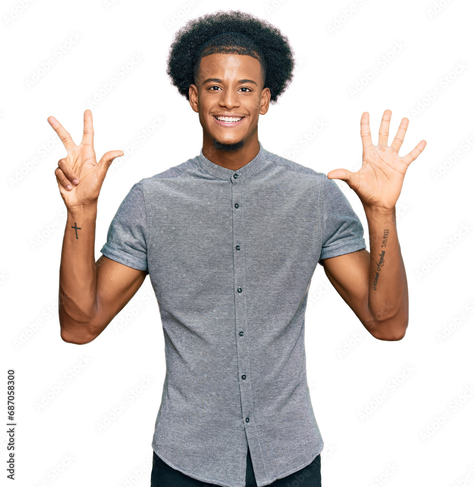African american man with afro hair wearing casual clothes showing and pointing up with fingers number eight while smiling confident and happy. African american man with afro hair wearing casual clothes showing and pointing up with fingers number eight while smiling confident and happy.