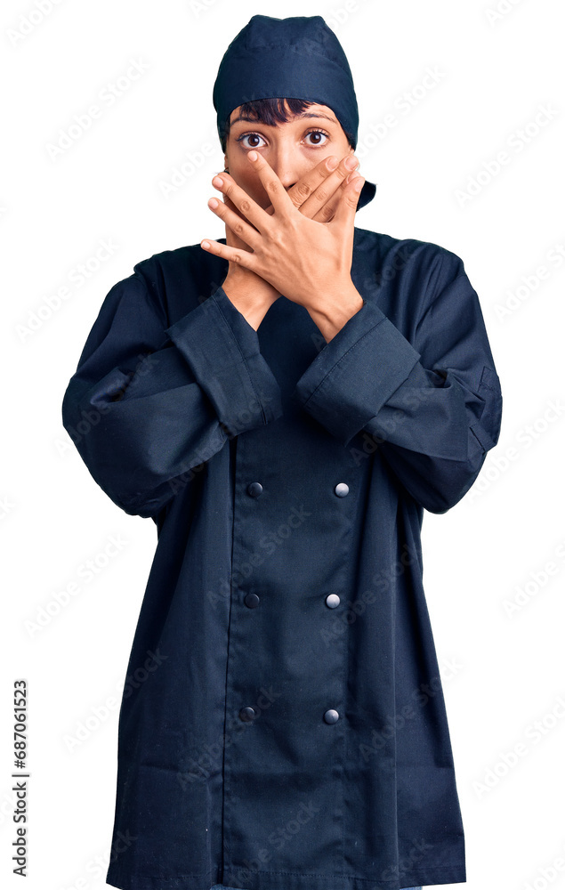 Φωτογραφία Young brunette woman with short hair wearing professional cook uniform shocked covering mouth with hands for mistake
