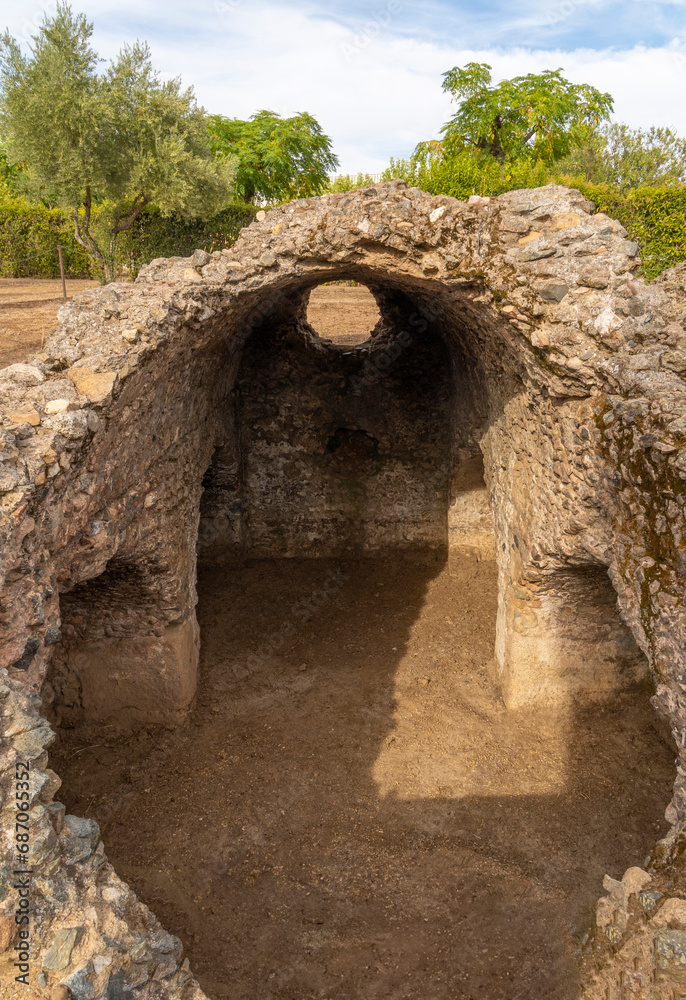 Remains of the archaeological ruins of the stone funerary mausoleum of Los Columbarios in the Roman cemetery of Mérida, Spain.