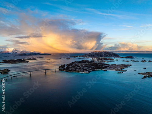 Fototapeta Naklejka Na Ścianę i Meble -  aerial view over Hillesøya and Sommarøy Islands with Storm Clouds during sunrise