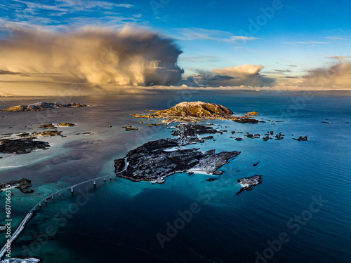 Obraz na płótnie aerial view over Hillesøya and Sommarøy Islands with Storm Clouds during sunrise w salonie