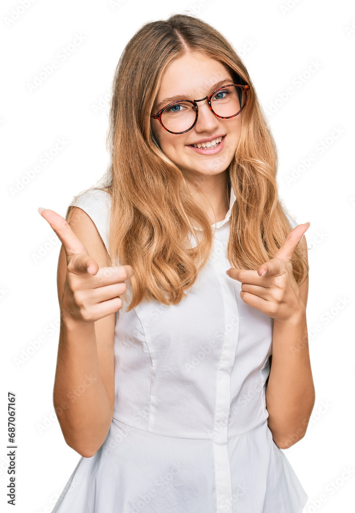 Beautiful young caucasian girl wearing casual clothes and glasses pointing fingers to camera with happy and funny face. good energy and vibes.