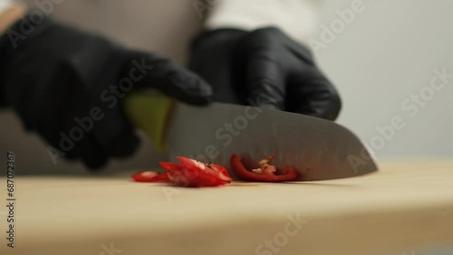 Cook preparing to cook Thai food by cutting chili pepper stock video, Homemade cooking concept