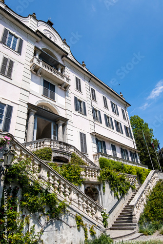 Como lake,Villa Carlotta - Impressive staircase and the facade overlooking the lake. Beautiful spring day, Tremezzo Lombardy Italy

