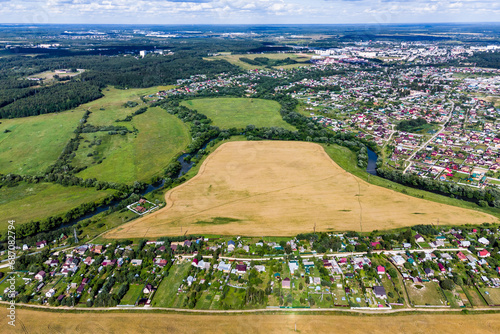 Aerial photo of rural area with Novomikhailovskoye village, Borovsky district, Kaluga region, Russia photo