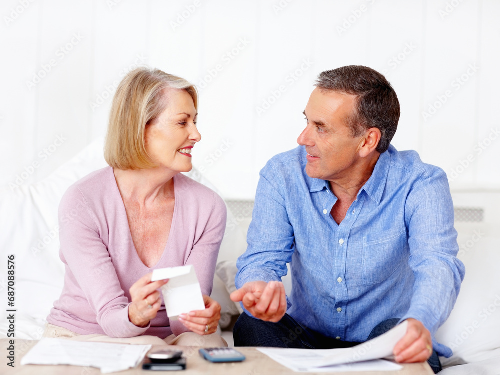Home, finance and senior couple with paperwork, budget and mortgage debt with insurance checklist, savings and asset management. Apartment, old woman and mature man with documents and retirement fund