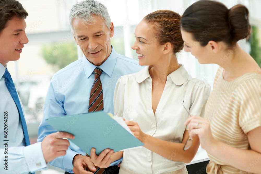 Business people, paperwork and collaboration on documents, cooperation and strategy in office. Colleagues, planning and brainstorming or analysis, discussion and meeting for report, teamwork on sale Business people, paperwork and collaboration on documents, cooperation and strategy in office. Colleagues, planning and brainstorming or analysis, discussion and meeting for report, teamwork on sale