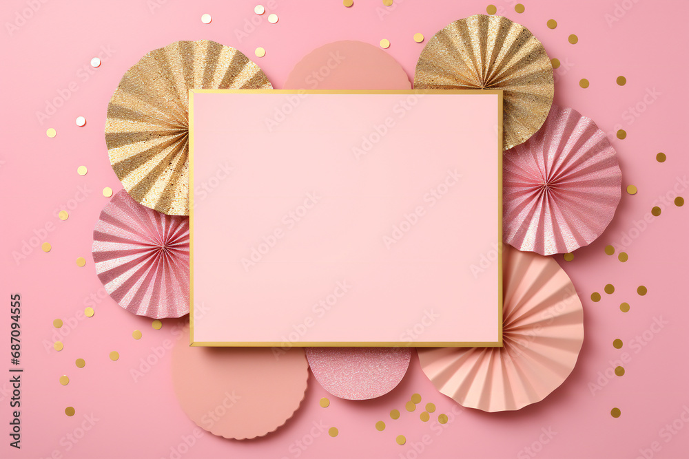 festive frame with gold and pink paper fans and round confetti on a pastel pink background for Christmas festive frame with gold and pink paper fans and round confetti on a pastel pink background for Christmas