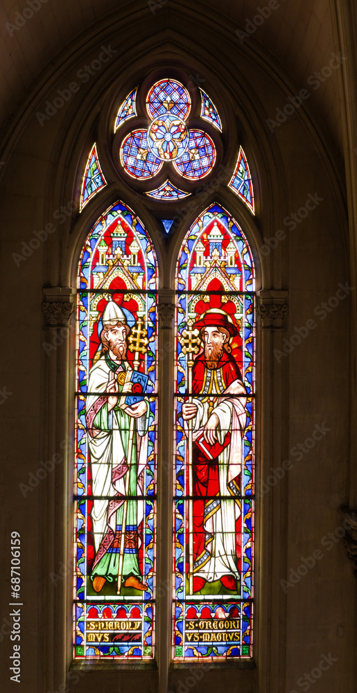 Saints on stained glass in Montpellier church
