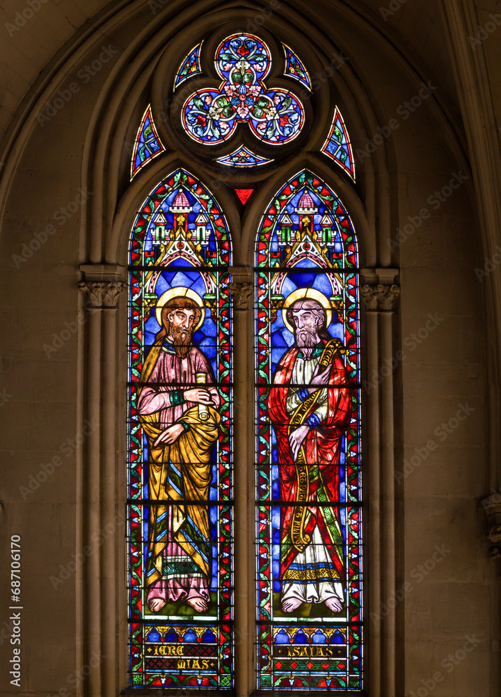 Sunlight shine through church windows colorful stained glass Montpellier
