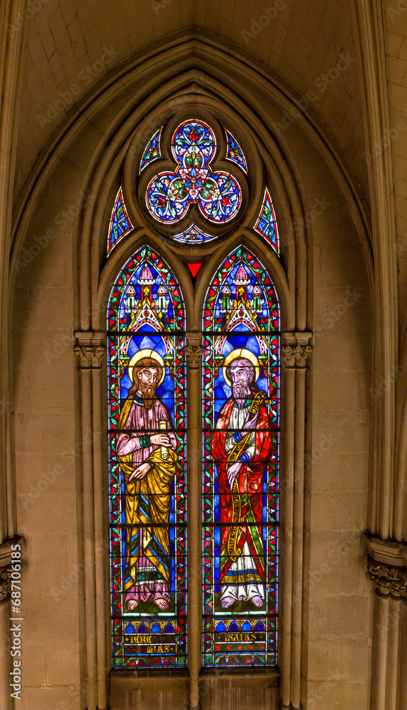 Stained glass window from a french church, featuring two biblical figures
