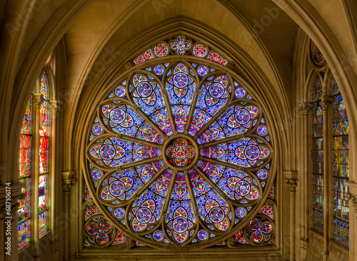  Intricate rose window with biblical imagery.