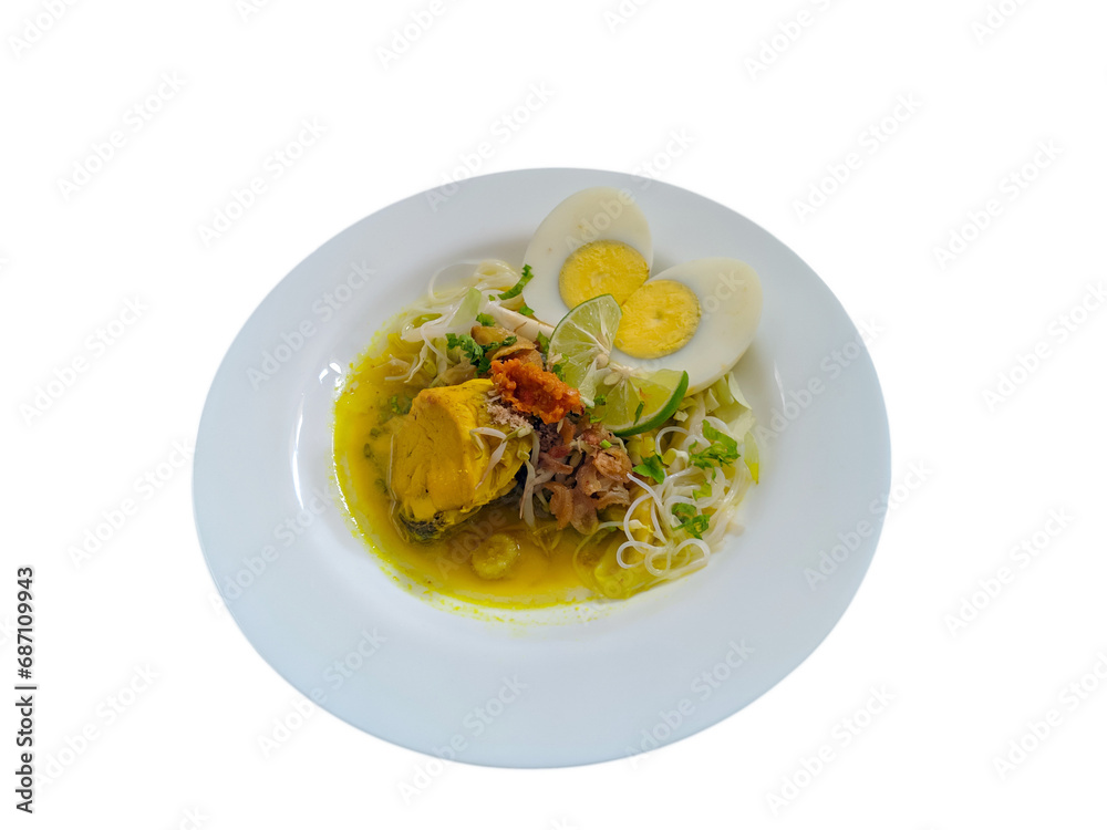 Indonesian chicken soup or soto ayam completed with sliced boiled egg, top view on white plate, isolated on white background Indonesian chicken soup or soto ayam completed with sliced boiled egg, top view on white plate, isolated on white background