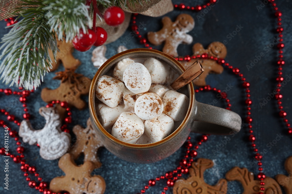 A cup of hot cocoa with white marshmallows in a mug. Christmas and new year. Winter holidays. A cup of hot cocoa with white marshmallows in a mug. Christmas and new year. Winter holidays.