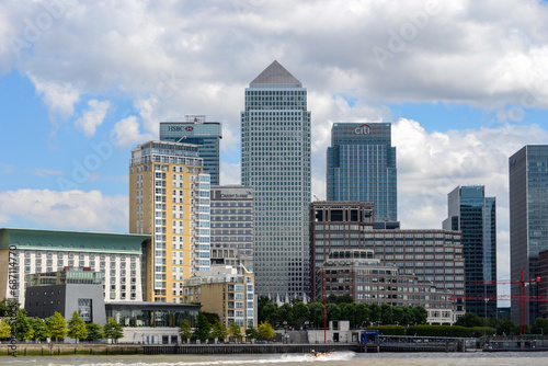 Canary Wharf, London, UK - August 9th 2013: Canary Wharf Pier on the River Thames in front of the skyscrapers.
