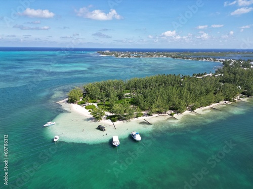 Starfish Point Rumpoint North Side Grand Cayman Aerial in the Cayman Islands Caribbean Sea British West Indies Beautiful pristine water with boats and island view