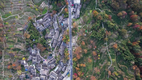 Aerial view of Chinese ancient village, Tachuan, Hongcun, Anhui, China. Drone fly view of traditional villages in sunny autumn day, 4k real time footage. photo