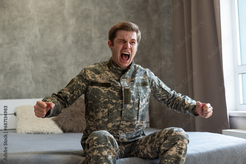Young caucasian man wearing camouflage army uniform angry and furious