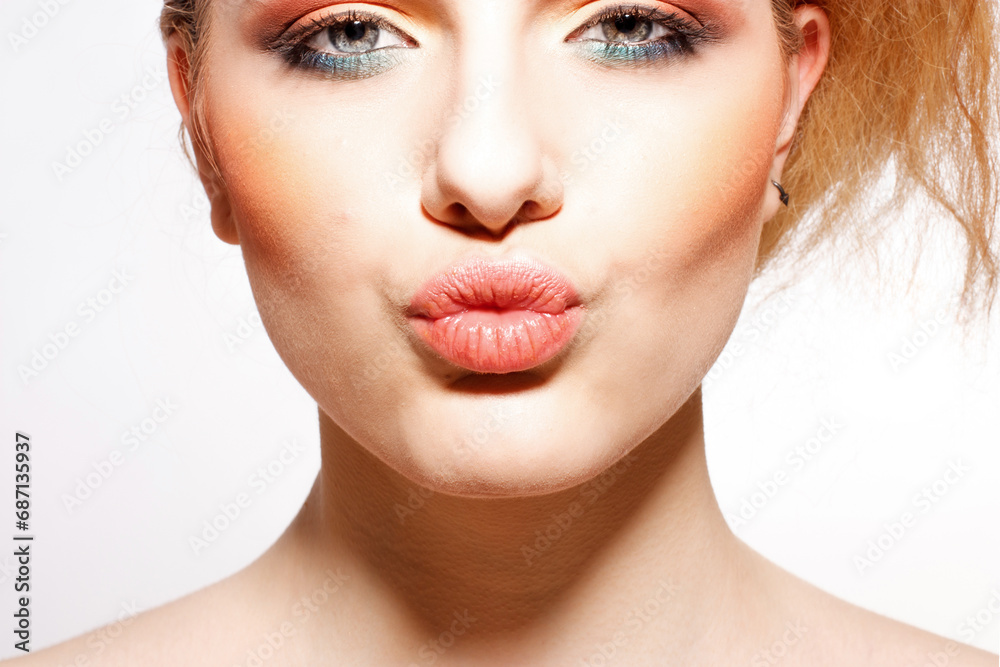 Portrait of beautiful blonde woman on a white background Portrait of beautiful blonde woman on a white background