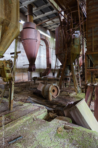 Abandoned feed mill near resettled village of Dronki in exclusion zone of Chernobyl nuclear power plant, Belarus photo