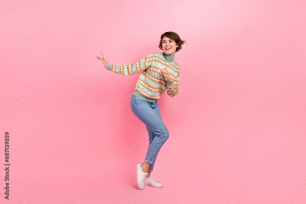 Full body photo of dancing girl print turtleneck winter season denim jeans casual apparel shopping season isolated on pink color background