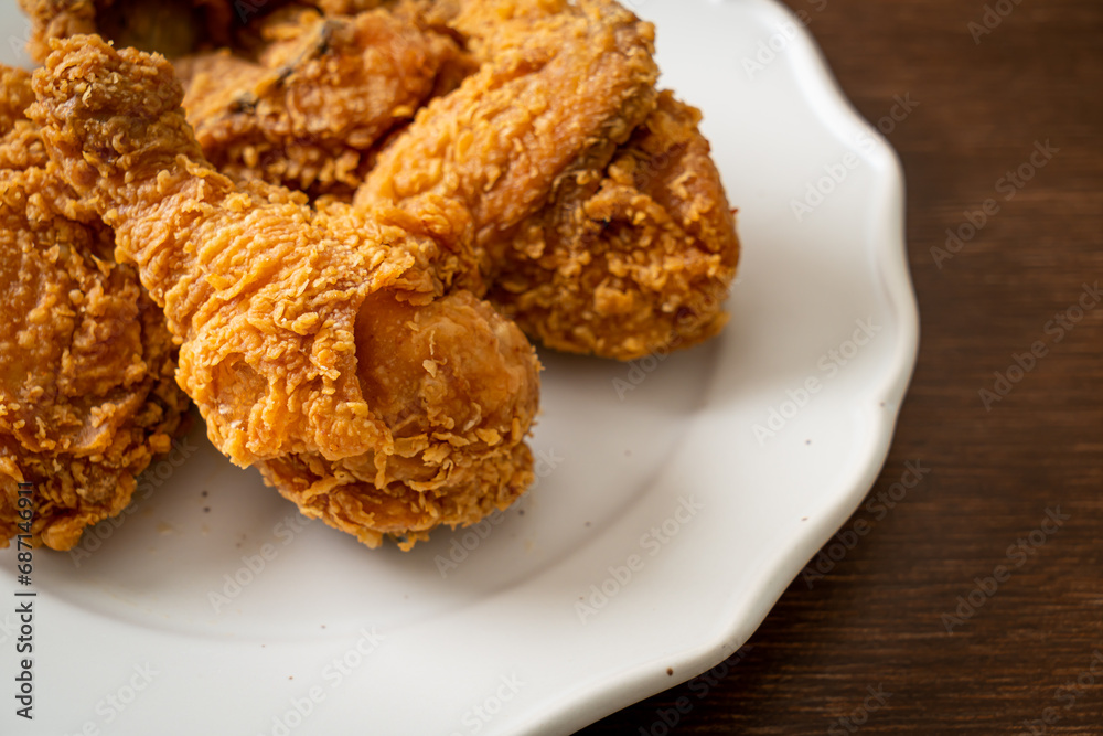 fried chicken with ketchup on plate fried chicken with ketchup on plate