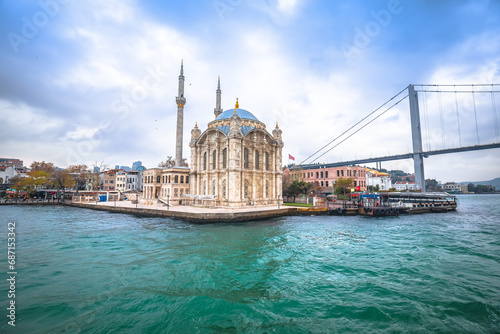 Ortakoy Mosque or Buyuk Mecidiye Camii and Bosphorus bridge in Istanbul view photo
