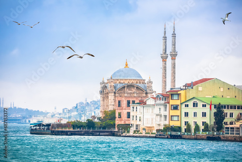 Ortakoy Mosque or Buyuk Mecidiye Camii and Bosphorus channel in Istanbul view photo
