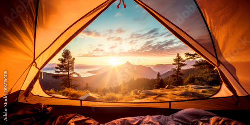 inside tent view to the mountains landscape at sunset. nature adventure © ronstik