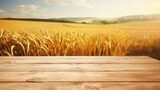 Empty old wooden table in the sunny day. Wheat rice field background.