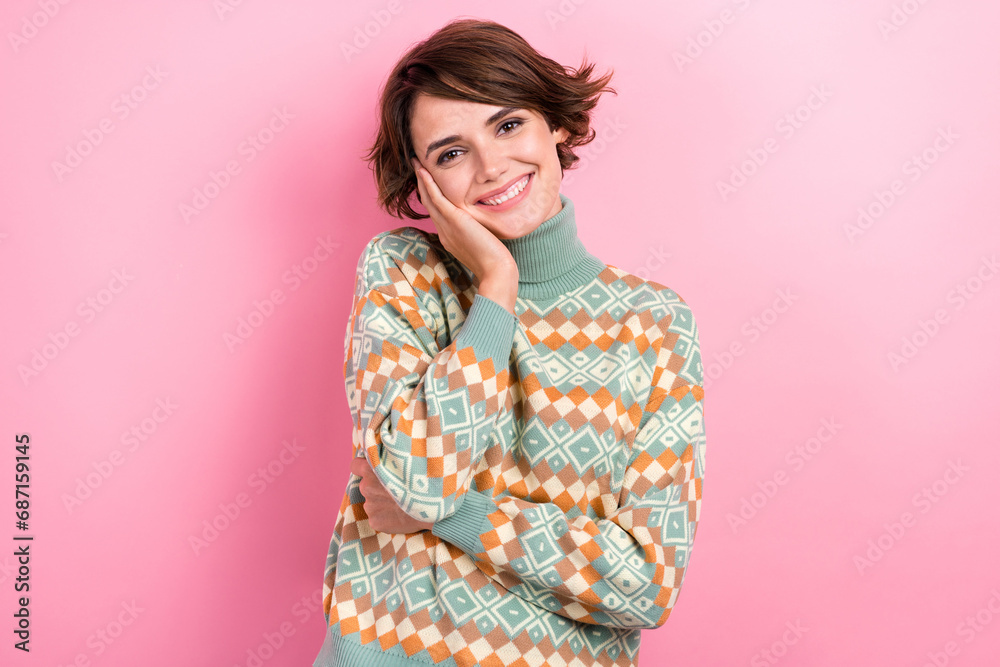 Photo of peaceful nice cheerful girl beaming smile arm touch cheekbone isolated on pink color background Photo of peaceful nice cheerful girl beaming smile arm touch cheekbone isolated on pink color background