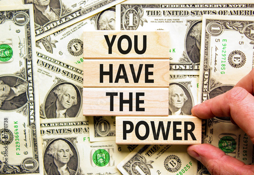 You have the power symbol. Concept word You have the power on beautiful wooden block. Dollar bills. Beautiful background from dollar bills. Business motivational you have the power concept. Copy space
