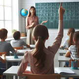 Kid in a classroom rising hand to give answer