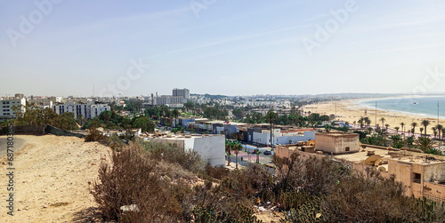 Natural view of Agadir city and nice beach on sunny day with beautiful sky. Moroccan atlantic ocean.