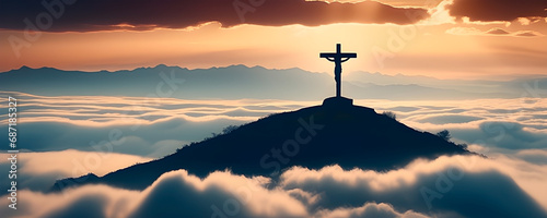 Silhouette of a cross on top of a hill above the clouds. Concept of faith and Christianity in banner format. photo