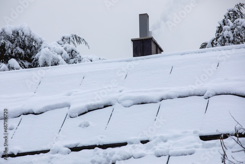 Snow-Covered Solar Panels on the Roof: Winter-Proof Renewable Energy