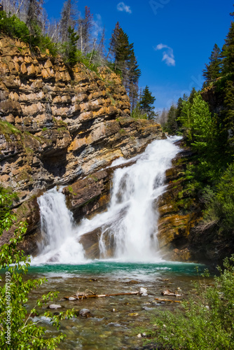 A scenic view of Cameron Falls in Waterton National Park in Alberta, Canada