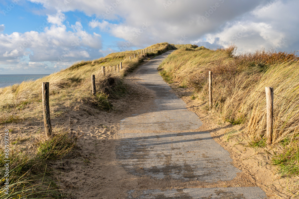 path made of concrete slabs in the dunes path made of concrete slabs in the dunes