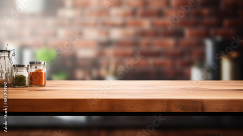 Wooden table or cutting board in the kitchen  with a bokeh blurred background. Copyspace banner