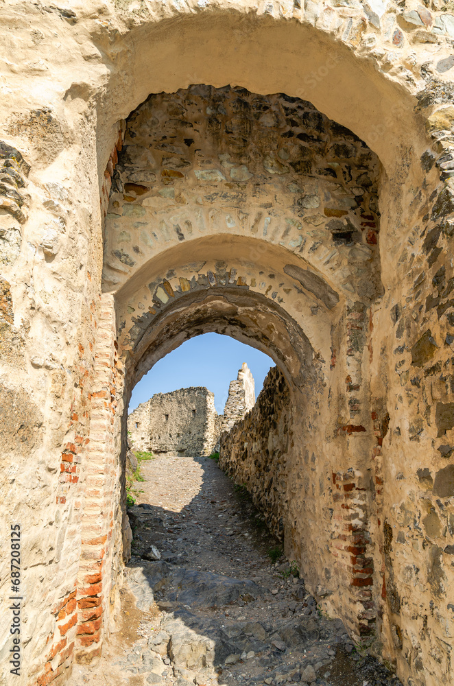 Passageway with arches in ruined ancient fortress