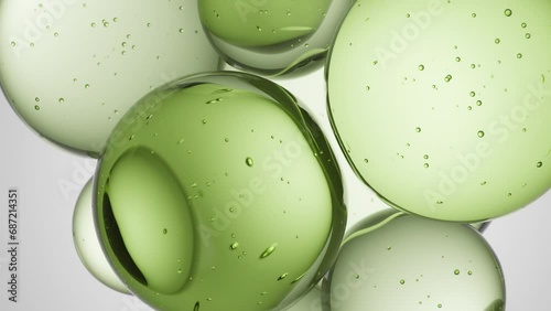 Cosmetics green serum liquid bubbles 3d abstract background. Cosmetic moisturizer essence gel. Collagen fluid bubble molecule. Moisturizing cream or oil. Personal health care and beauty skin concept