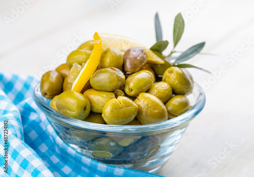 Cracked green olives. Crack...
