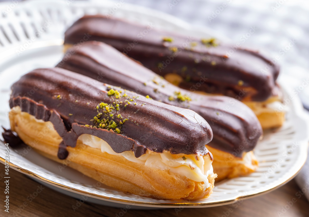 Traditional french eclairs with chocolate.