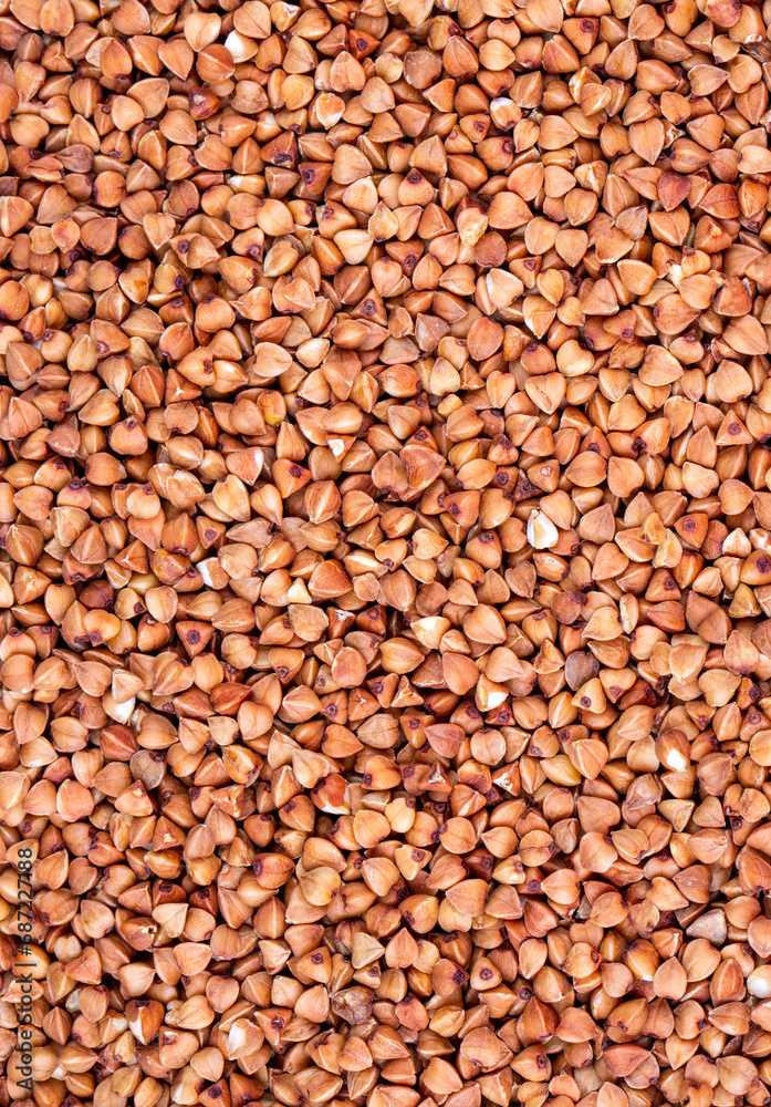 Background of dried buckwheat with whole large kernel - Diet concept - Close up Background of dried buckwheat with whole large kernel - Diet concept - Close up