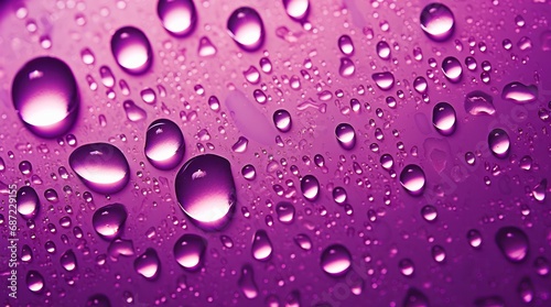 Water drops on violet background.